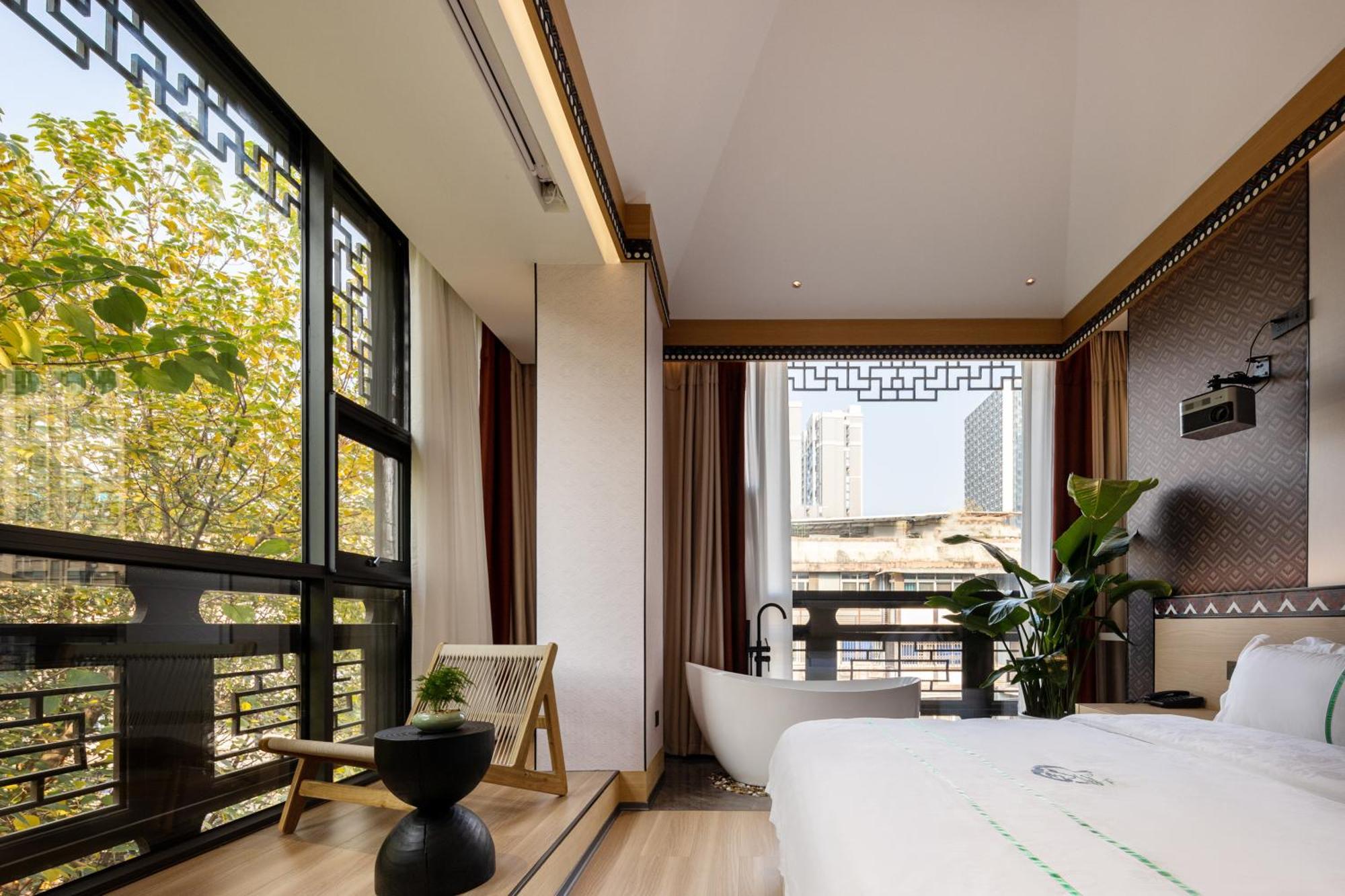 Xishu Garden Inn - Travel Agency Service - Car Rent Service - English Speaking Chengdu Eksteriør billede