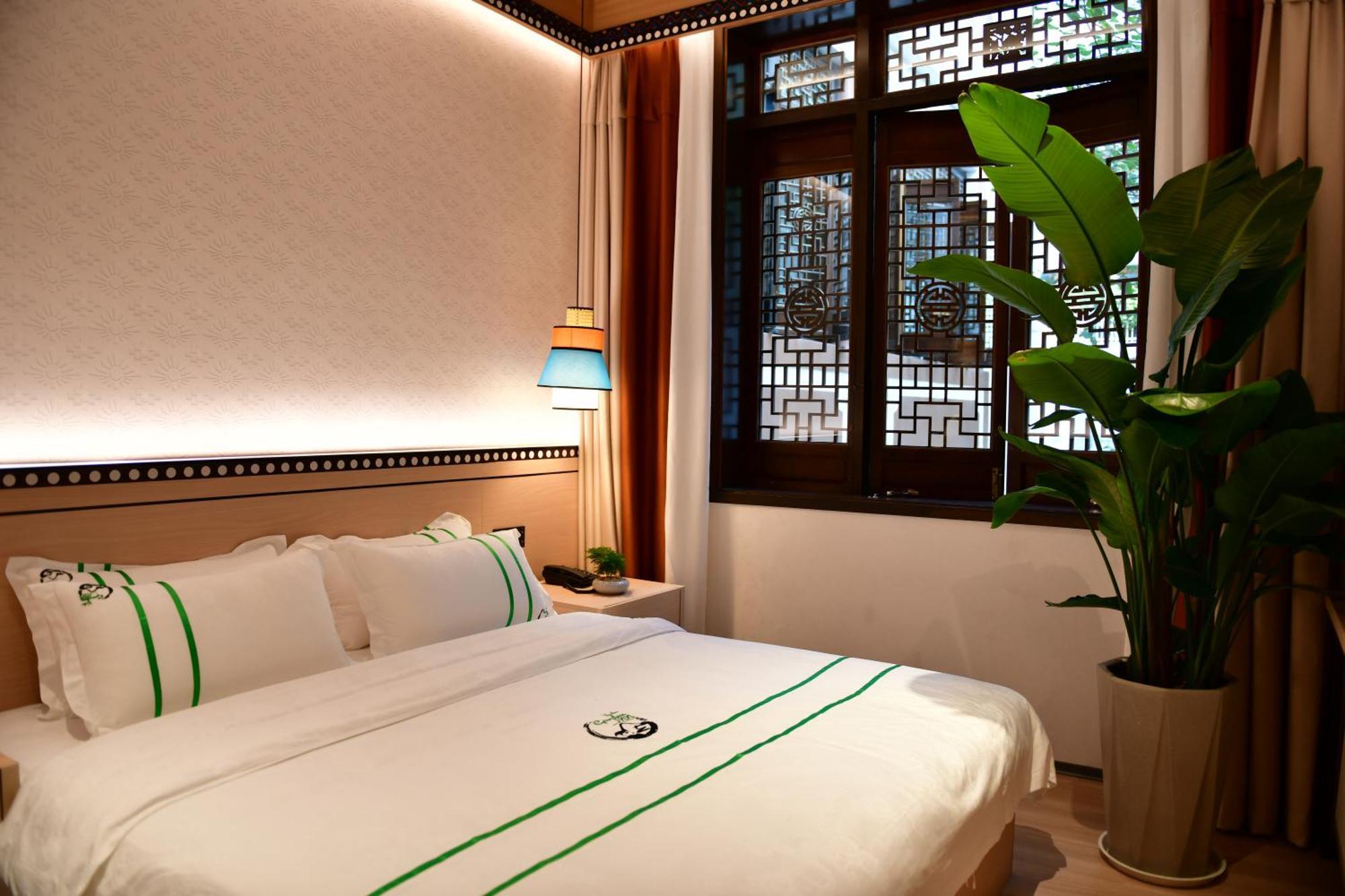 Xishu Garden Inn - Travel Agency Service - Car Rent Service - English Speaking Chengdu Eksteriør billede